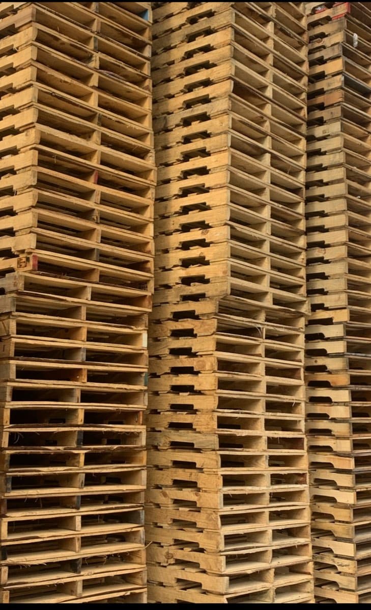 Stacks of GMA wooden pallets ready for dispatch